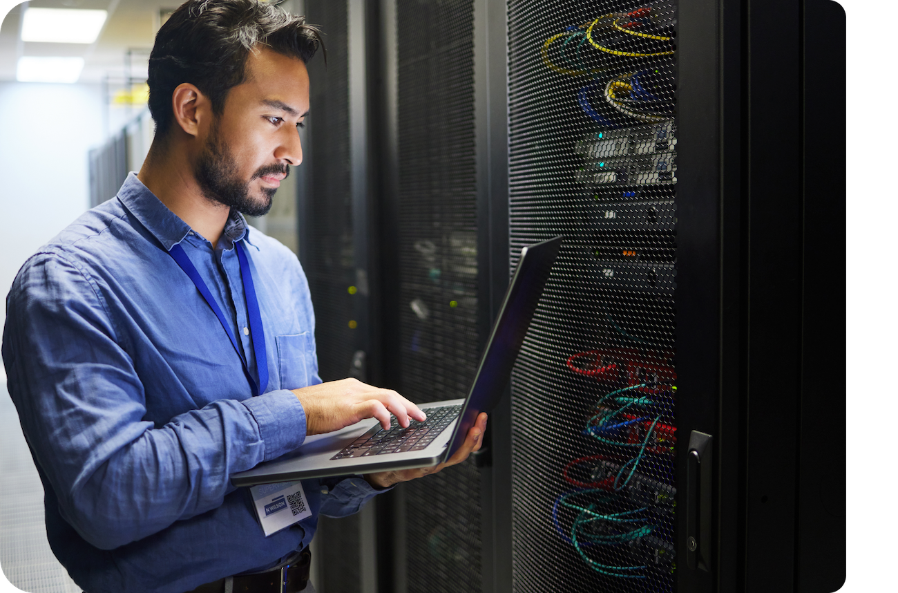 A man oversees computer security in the server room